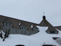 Snow piled high against the windows of Timberline Lodge